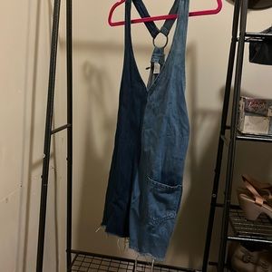 Denim dress. 1 pocket. Half dark denim half light denim. Super cute!